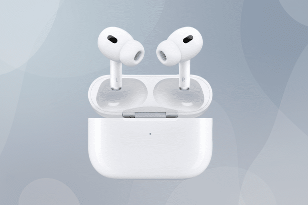 A pair of white Apple AirPods Pro ( 2nd generation) earbuds resting in their open charging case, set against a professional grey background with subtle , soft circular patterns.