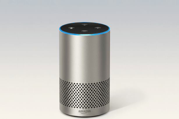alt text: An Amazon Echo speaker with a blue light ring , presented on a subtle gradient backgroun