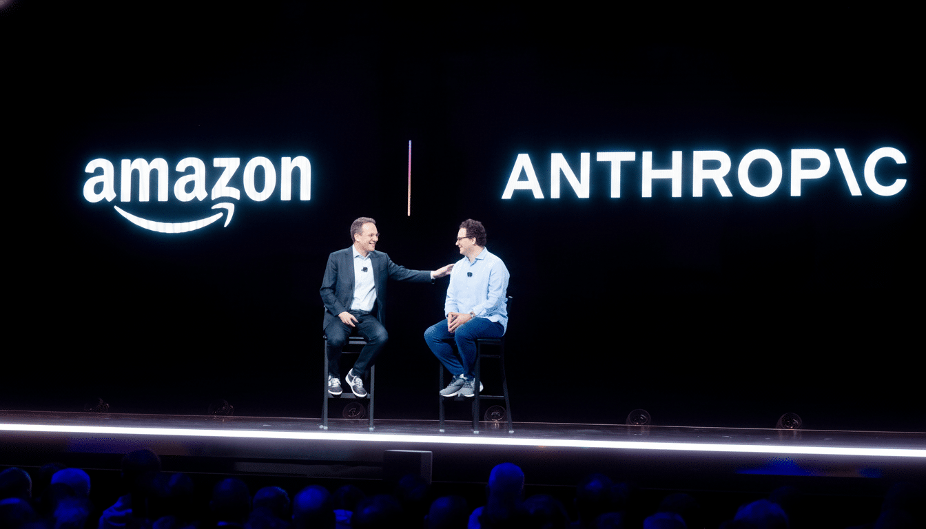 Two men , one in a suit and one in a light blue shirt, sitting on stools on a stage with amazon and ANTHROPC projected on the black background. Filename : amazonanth ropicstage presentation .png