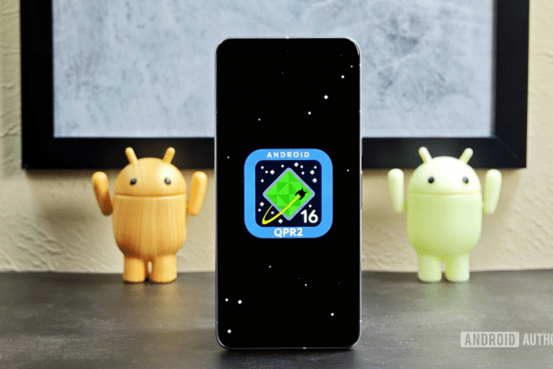 A smartphone displaying the Android 16 QPR 2 logo, with two Android figurines on either side.