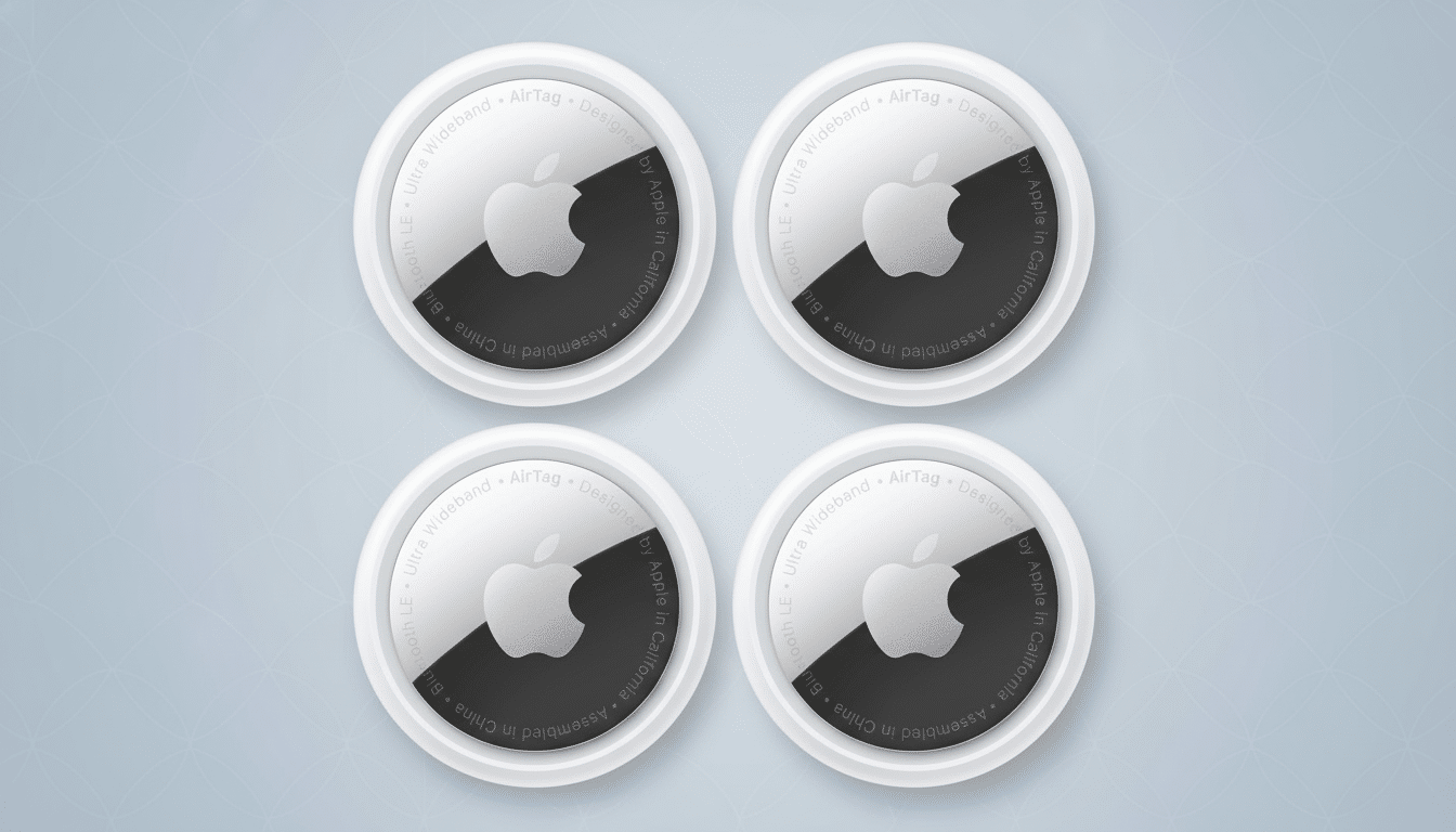 Four Apple AirTags on a soft gray gradient background with subtle abstract patterns, professionally presented in a 1 6:9 aspect ratio. Filename : apple airtags professionaldisplay .png
