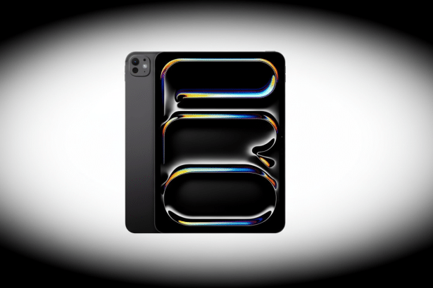 A professional , enhanced image of a dark grey iPad Pro with a vibrant , abstract display , set against a subtle white and grey gradient background. Filename : ipad proabstract display. png