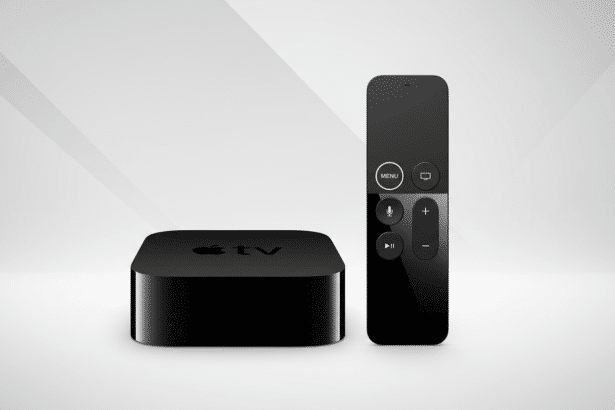 lt Text : An Apple TV 4K device and its remote control, displayed on a clean white background with a