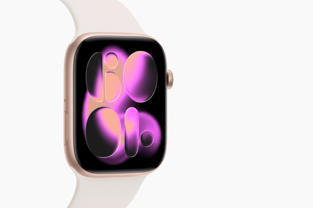 Close -up of a gold Apple Watch with a white band, displaying a colorful, abstract watch face. Filename : apple watchgold whiteband .png