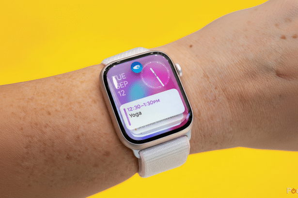An Apple Watch on a person s wrist, displaying a calendar notification for Yoga from 12: 30-1: 30 PM on Tuesday, September 1 2th, against a vibrant ye