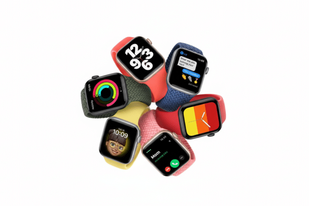 A professional arrangement of several colorful Apple Watches on a white background , showcasing various watch faces and strap colors. Filename : applewatches arrangement.png