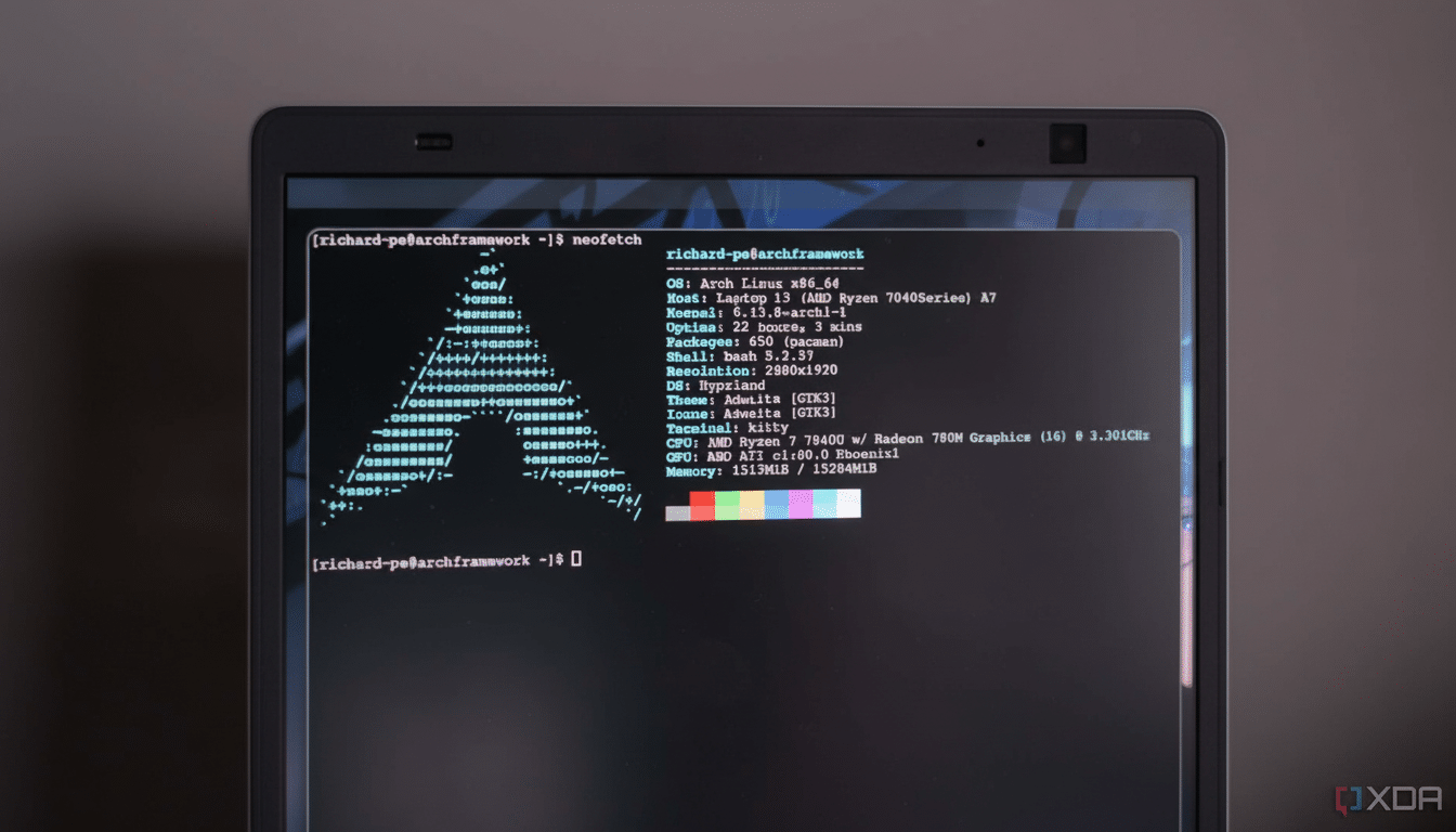 A laptop screen displaying a terminal window running `neofetch `, showing system information for an Arch Linux installation with an AMD Ryzen 7 processor and Radeon 780M Graphics .