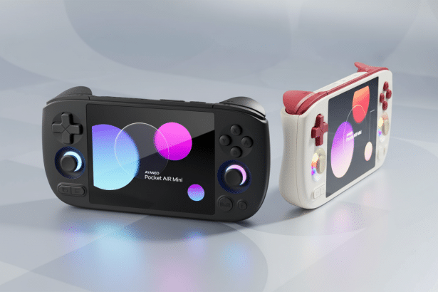 A professional 16:9 shot of two AYAN EO Pocket AIR Mini handheld gaming consoles, one black and one white with red accents, on a light gray surface .