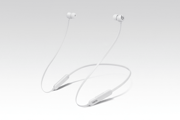 White Beats Flex wireless earphones presented professionally on a subtle gray background with a soft geometric pattern.