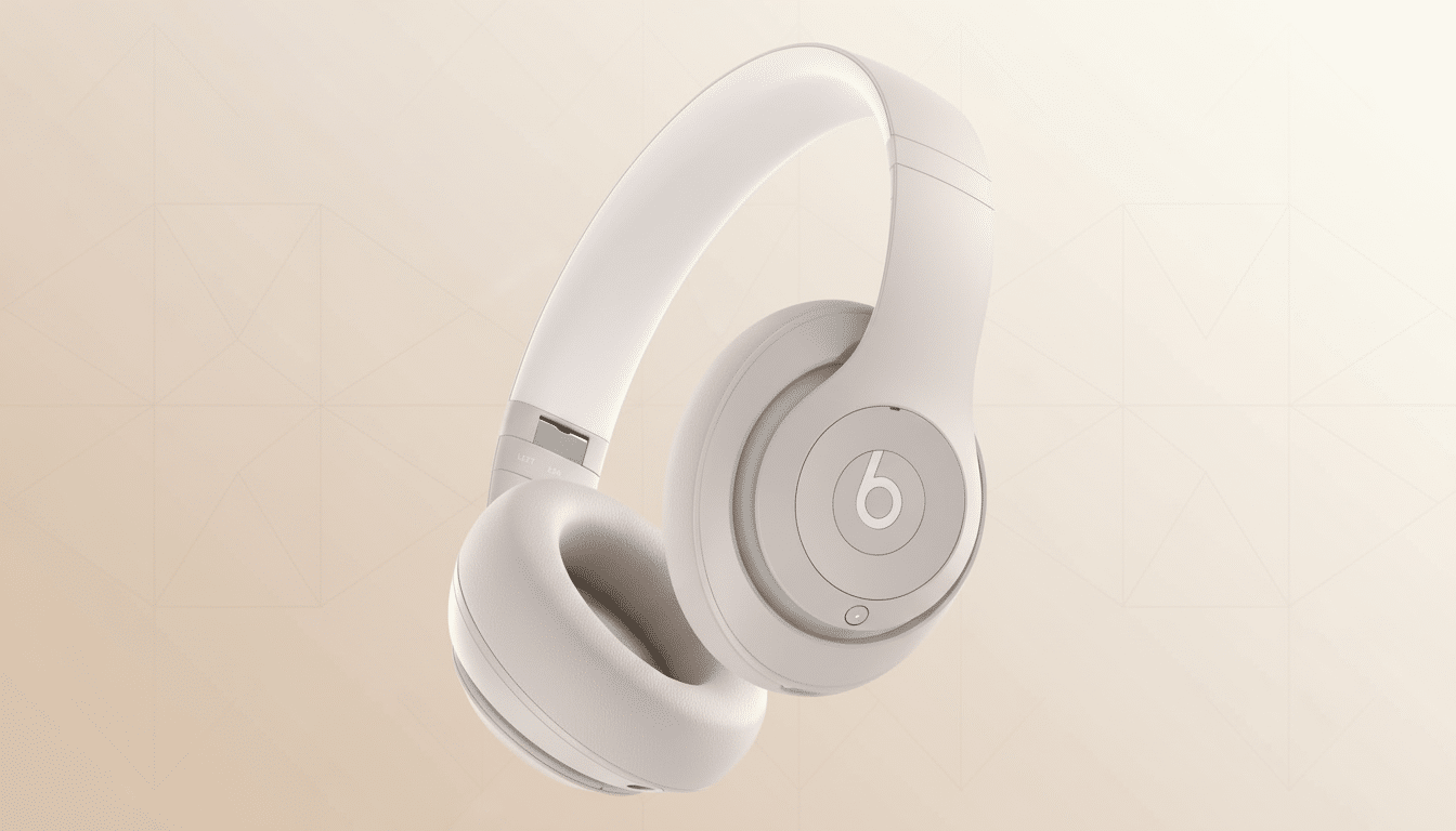 A pair of beige Beats Studio headphones shown from a slightly elevated angle against a soft , gradient background with subtle geometric patterns. Filename : beatsstudio headphonesbeige . png