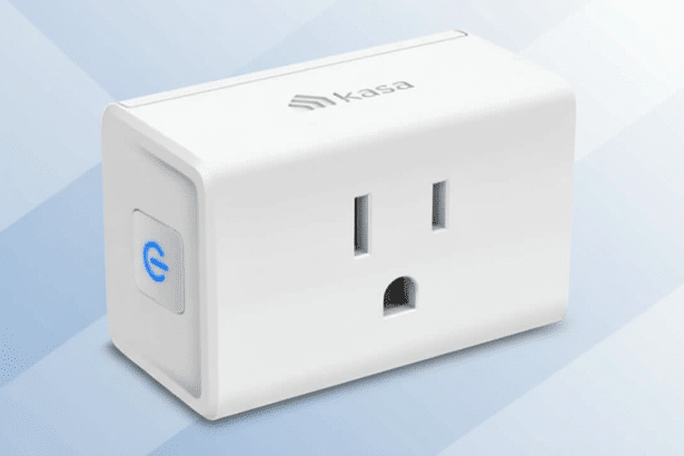 A white Kasa smart plug with a blue power button on a soft blue gradient background.