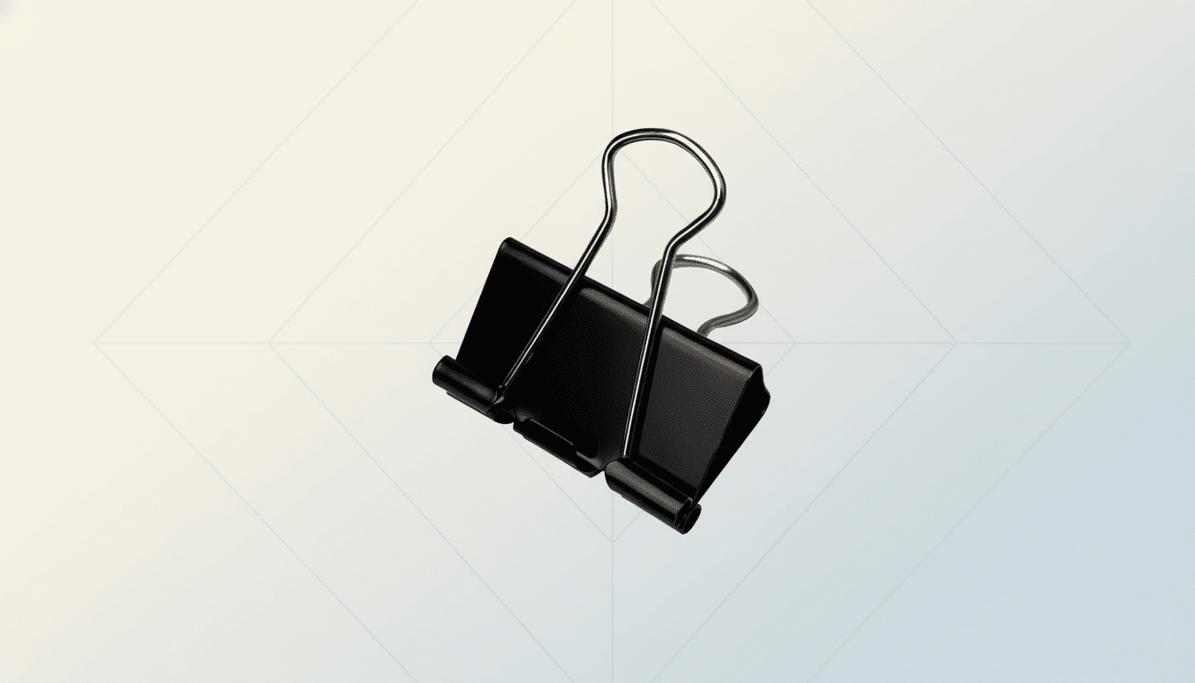 A black binder clip with silver handles , set against a professional light grey background with subtle geometric patterns and a soft gradient. Filename : binderclip professionalbackground .png