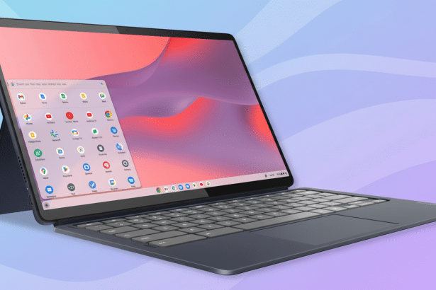 A dark blue laptop with a detachable keyboard, displaying a colorful operating system interface, set against a soft purple and blue gradient backgroun