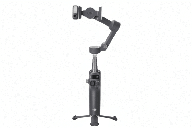 A dark gray DJI Osmo Mobile gimbal with a phone holder and tripod base , presented on a white background .