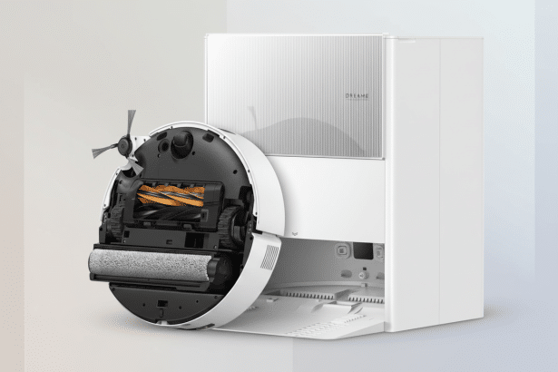 A white Dreame robot vacuum cleaner with its base station on a professional flat design background with soft patterns and gradients. The underside of the robot is visible, showing its brushes and rollers.