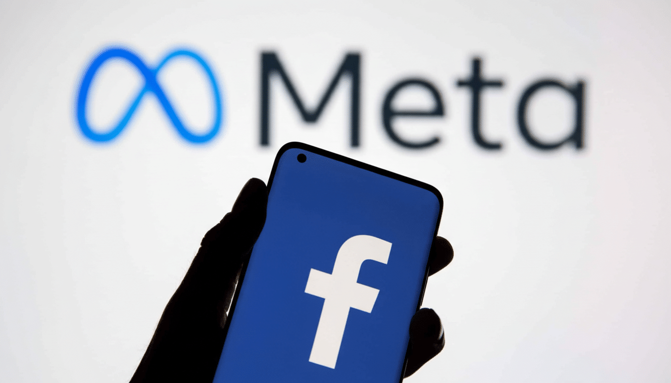 A hand holding a smartphone displaying the Facebook logo against a blurred background of the Meta logo.