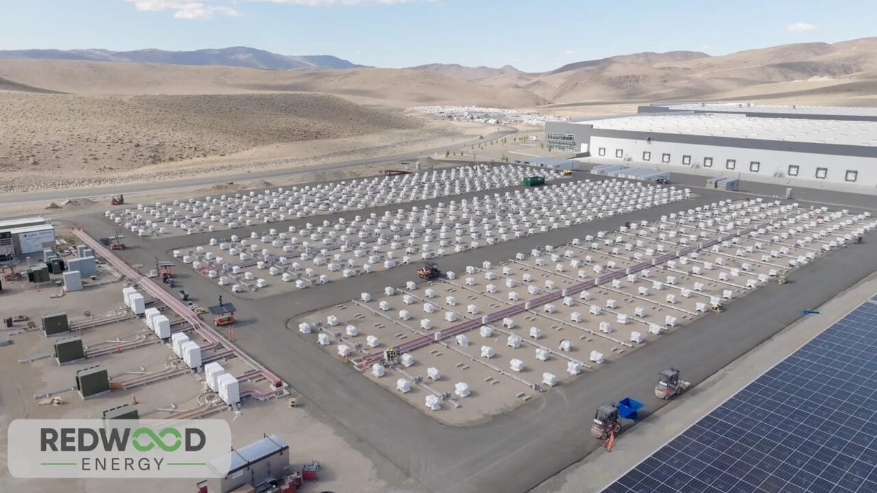 Repurposed EV batteries in second-life storage racks at a grid-scale facility