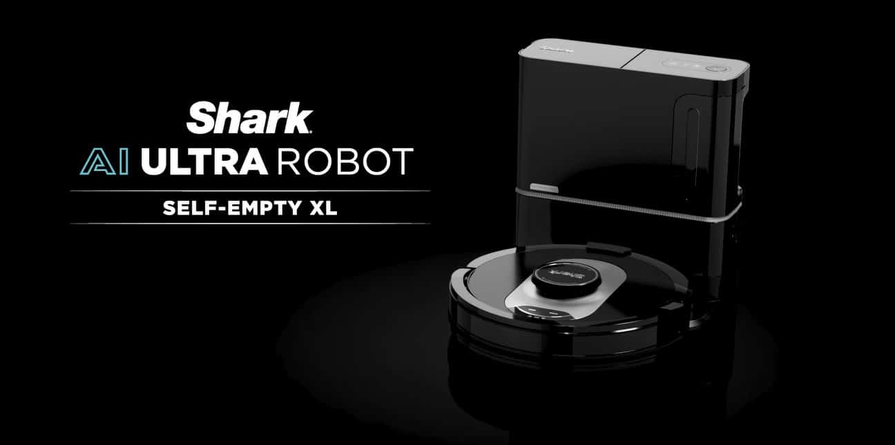 Feature-rich robot vacuum on sale cleaning hardwood floor near charging dock