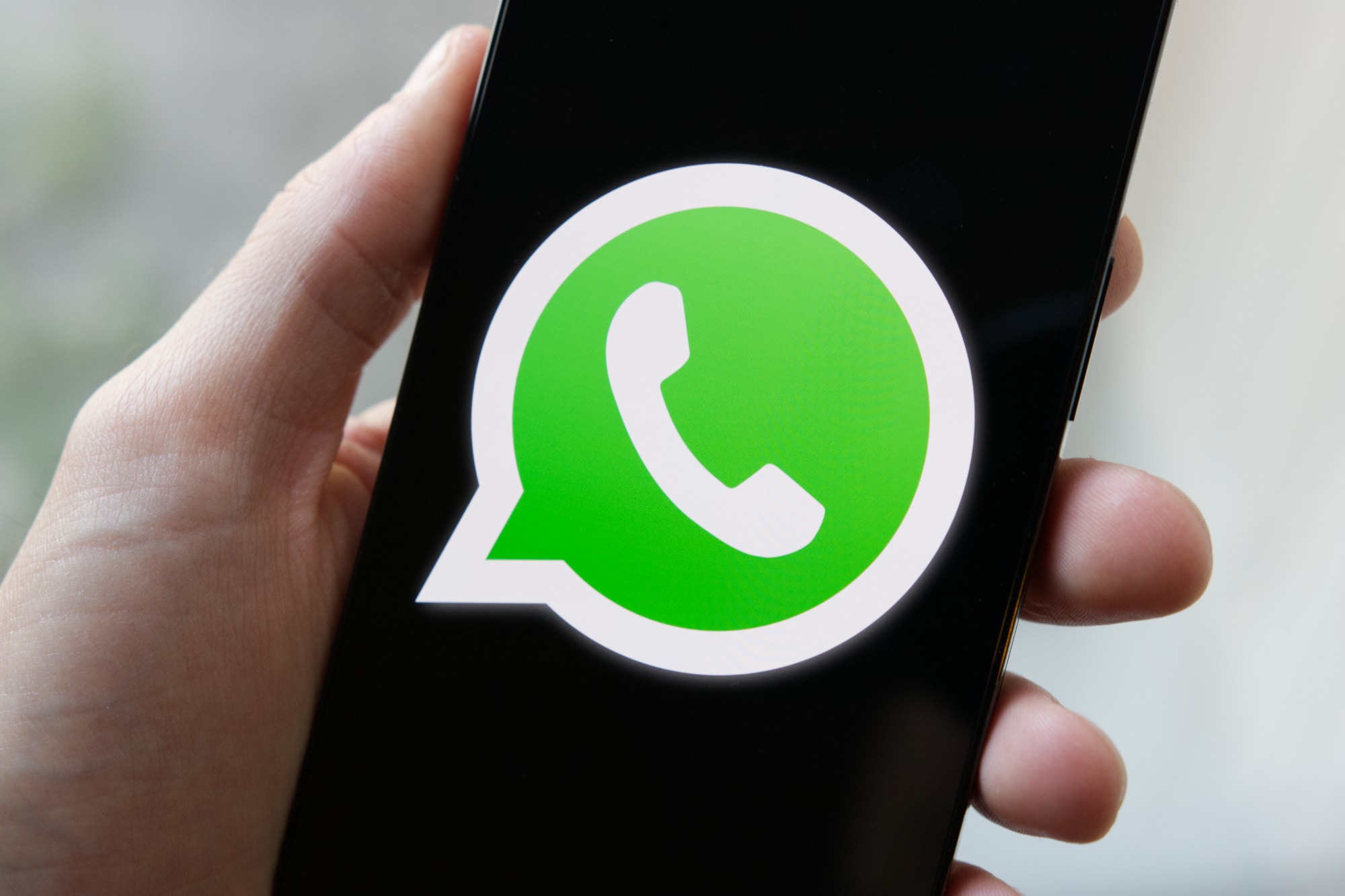 WhatsApp and Messenger logos illustrating new features and updates