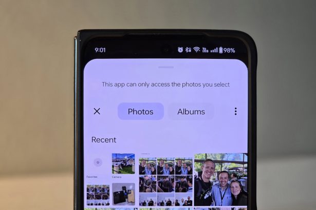Smartphone showing messages and photos with a padlock symbol to emphasize security