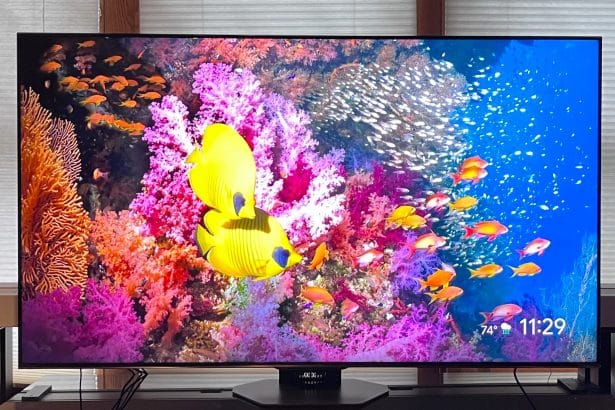 Flat-screen 4K TV with sale price tag in electronics store
