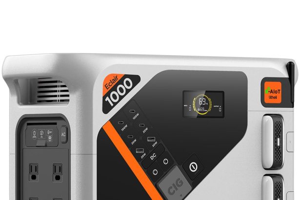 Portable power station with LCD display, AC outlets, USB ports, and rugged carry handle