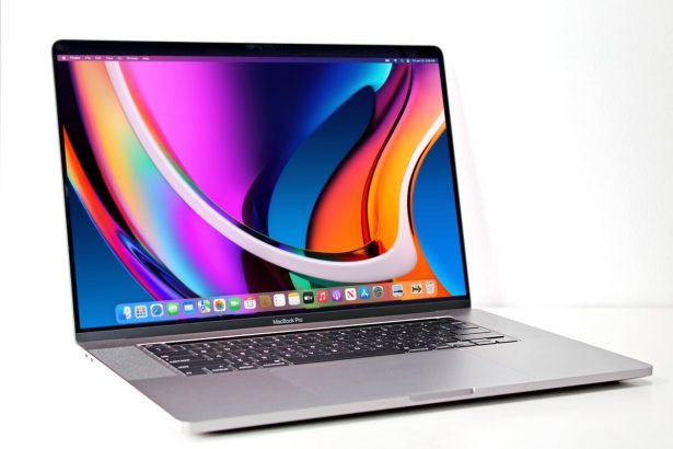 Apple MacBook Pro touchscreen concept showing touch gestures on macOS