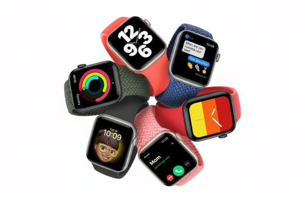 A professional arrangement of several Apple Watch devices in different colors and strap styles, showcasing various watch faces and app screens, presen