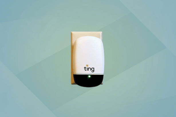 A white and black Ting smart outlet with a green light, plugged into a wall socket , set against a professional soft blue gradient background.