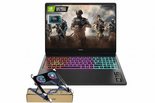A black gaming laptop with a colorful backlit keyboard and a gaming scene on its screen, featuring NVIDIA GeForce RTX 3 060 graphics . In the foreground, a portable blue laptop cooling stand with two fans rests on a cardboard box. Filename : gaminglaptop coolingstand .png
