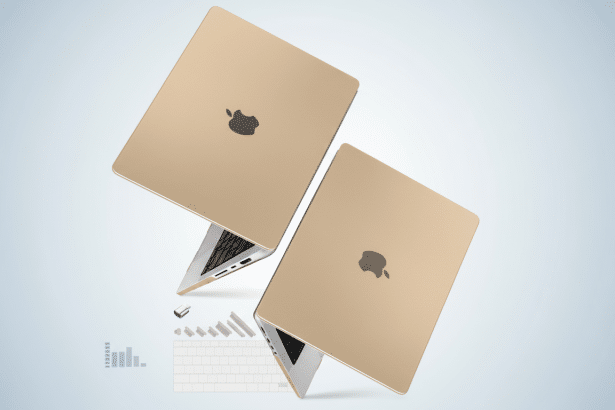Two gold- colored laptops with the Apple logo on their covers, presented at an angle on a light gray background with subtle graphic elements .