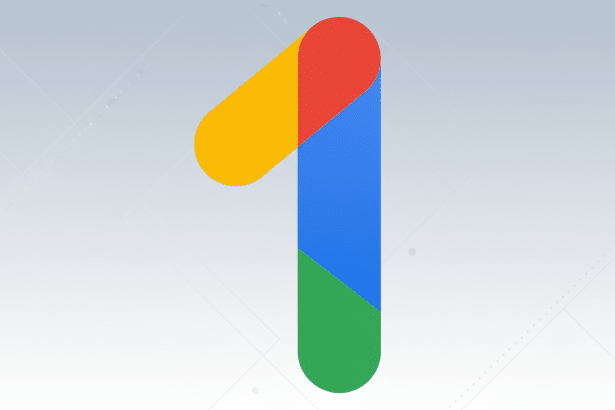 The Google One logo, a stylized number 1 in red , yellow, blue , and green, set against a light gray professional background with subtle geometric patterns. Filename : googleone logoenhanced .png