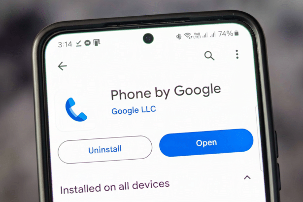 A smartphone displaying the Google Phone app page, with Open and Uninstall buttons visible.