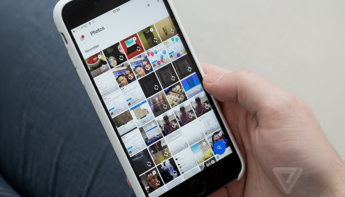 alt text= A hand holding a smartphone displaying a photo gallery app with various images, resized