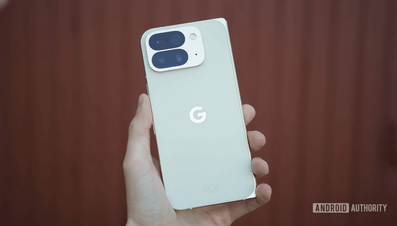 A hand holding a light green Google Pixel phone , showcasing its back design and camera module against a blurred reddish -brown background.