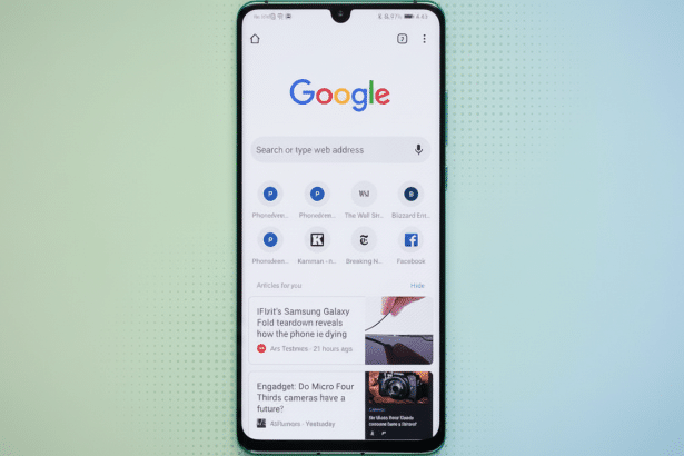 Al text : A smartphone displaying the Google search page and news articles on a soft green and blue