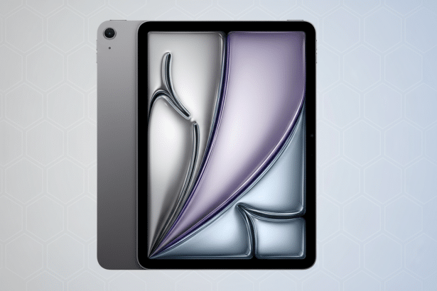 A professional shot of a gray tablet with a dynamic , abstract purple and silver background on its screen , set against a subtle gray geometric pattern.