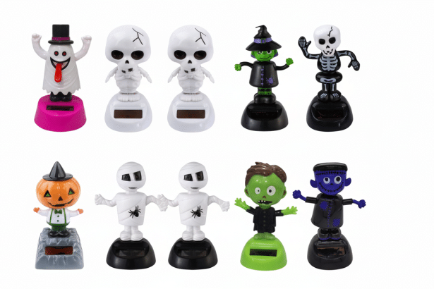alt =Eight solar-powered dancing Halloween figures, including a ghost, skeletons , witches, a pumpk