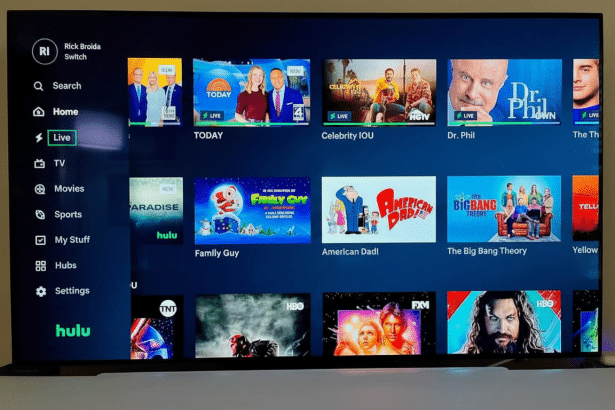 A TV screen displaying the Hulu Live TV interface with various shows and channels. The aspect ratio has been adjusted to 16:9 , and the image is professionally enhanced while preserving the original content .