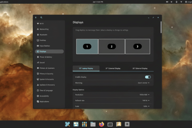 A screenshot of a Linux desktop environment showing the Displays settings window. The window has options for Wi -Fi, Networking, Bluetooth, Desktop, I