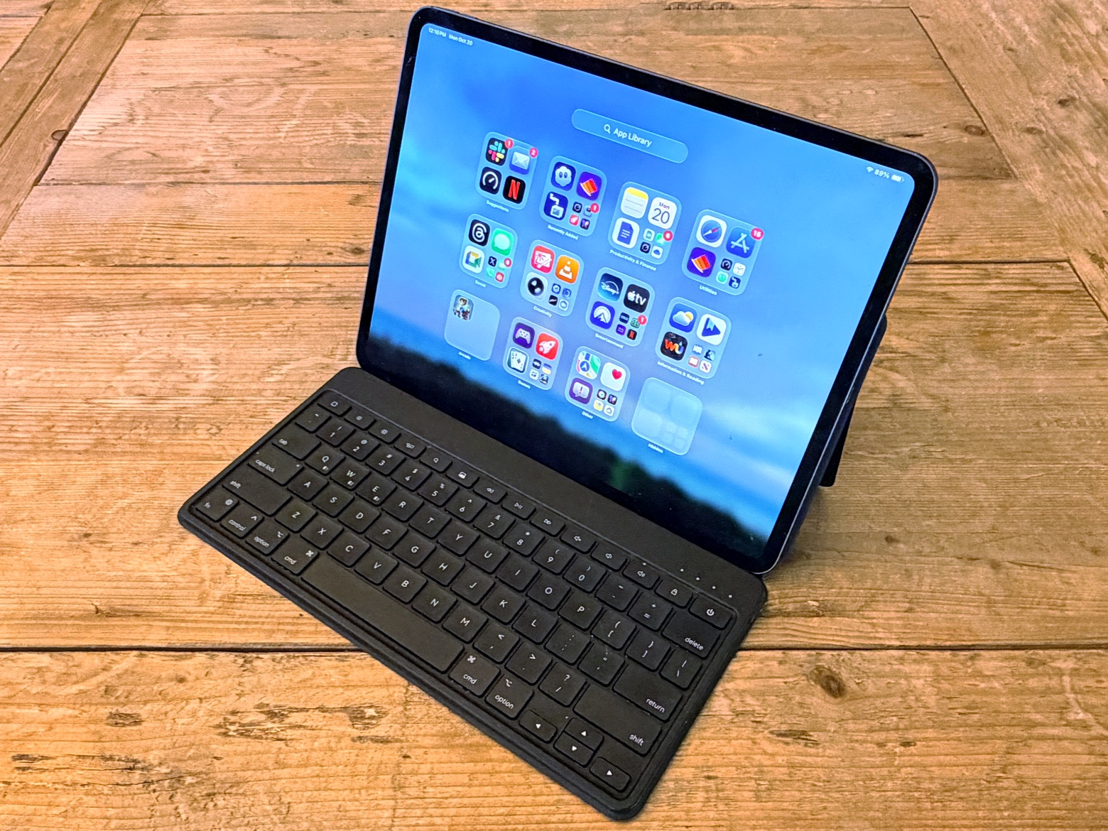 Foldable Bluetooth keyboard connecting to tablets and phones for mobile typing