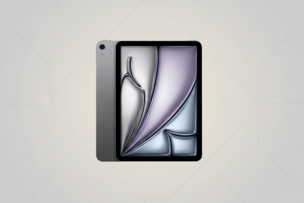 A gray iPad with a screen displaying abstract silver and purple shapes, set against a professional light gray background with subtle geometric pattern
