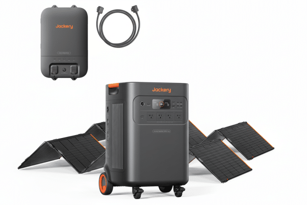 A professional 16:9 image showing a Jackery portable power station with solar panels and a charger against a clean white background.