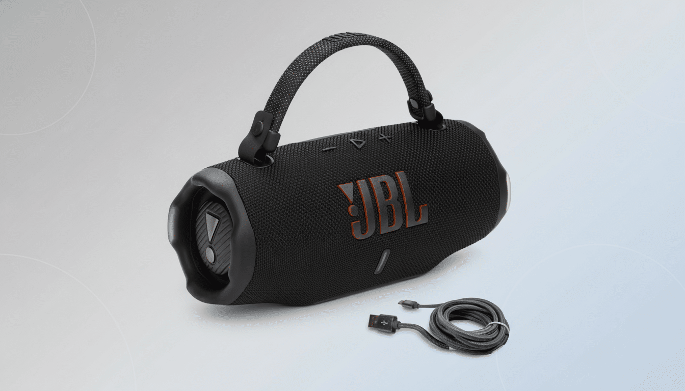 A black JBL X treme 3 portable Bluetooth speaker with a fabric handle and an accompanying charging cable, set against a professional light grey background with subtle circular patterns. Filename : jbl xtreme3 speakerprofessional .png