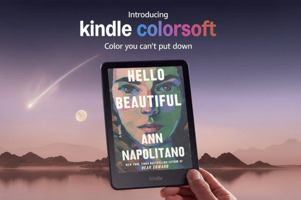 A hand holds a Kindle Color soft e-reader displaying the cover of Hello Beautiful by Ann Napolitano , set against a background of mountains, a lake , a moon , and a shooting star under a gradient sky. Filename : kindlecolor softhello beautiful.png