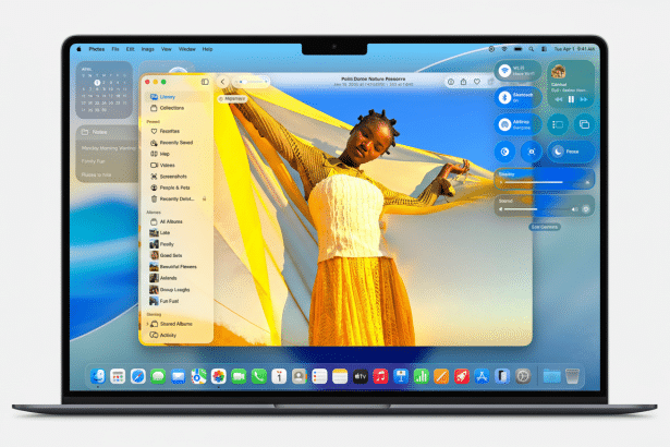 A professional shot of a laptop displaying an image of a woman in a yellow dress .