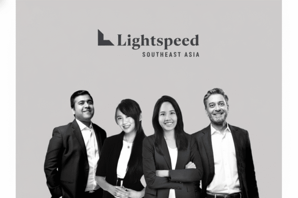 A professional black and white group photo of four individuals— two men and two women—standing in front of a light gray background with the Lightspeed