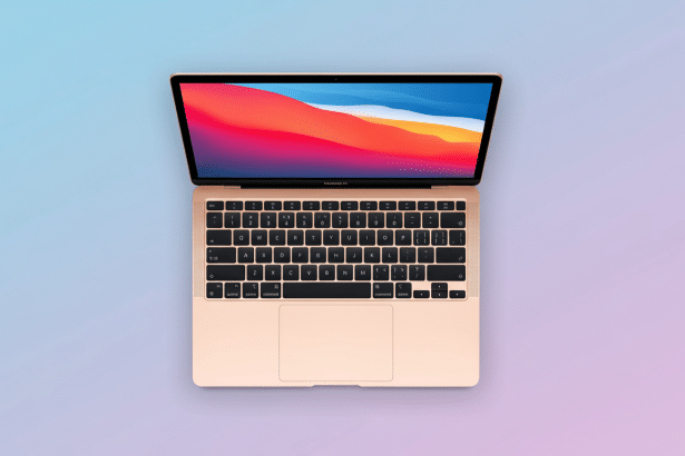 Gold MacBook Pro with a colorful desktop background displayed on a professional flat design gradient background. Filename : goldmac bookpro gradientbackground. png