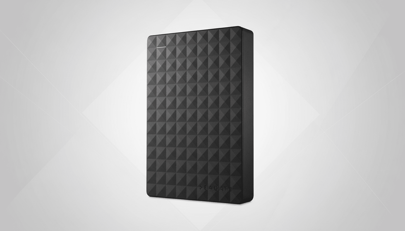 A black Seagate external hard drive with a textured diamond pattern on its surface , presented on a light grey background with a subtle geometric pattern. Filename : seagate hard driveprofessional . png