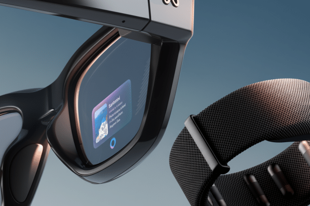 Close -up of black smart glasses displaying a Santorini notification and a black smart wristband.